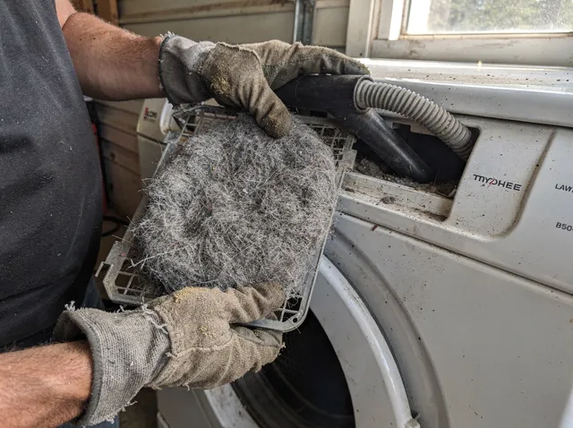 Cleaning Dryer Lint Trap in Acushnet